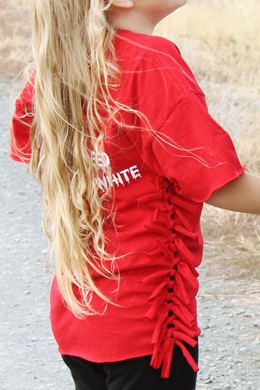 little girl wearing side-knotted t-shirt