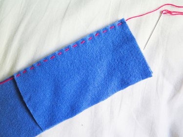 One side of the DIY pencil case sewn with a running stitch