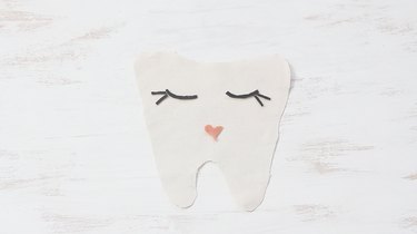 Eyes and mouth arranged on fabric