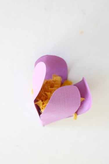 Cup paper inwards.