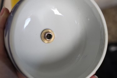 Nipple threaded through the hole