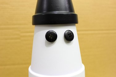 eyes on clay pot snowman