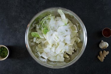Shredded cabbage in a large bowl