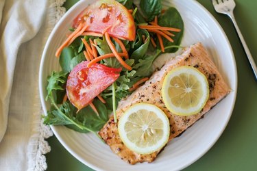 Salmon on a plate with salad