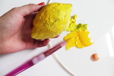 Painting papier-mache lemon