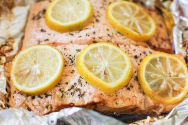 two salmon fillets in a foil packet