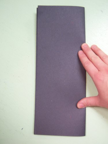Keep the paper edges aligned.