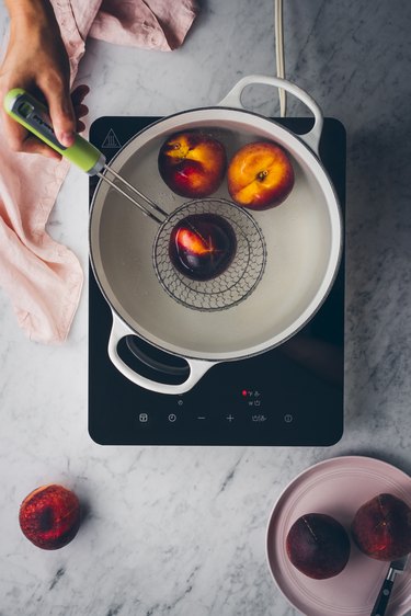 Peaches soaked in hot water