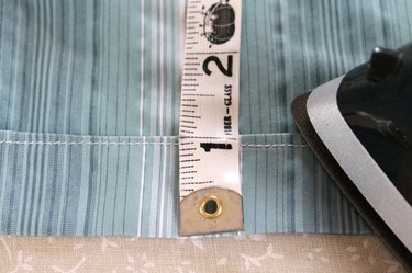 pressing under an inch on the bottom of the shirt