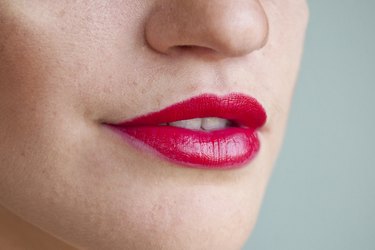 a woman with red lipstick