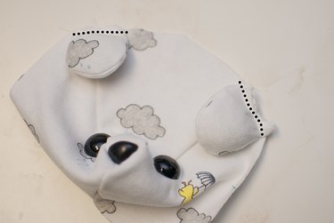 Add the ears to the front head.