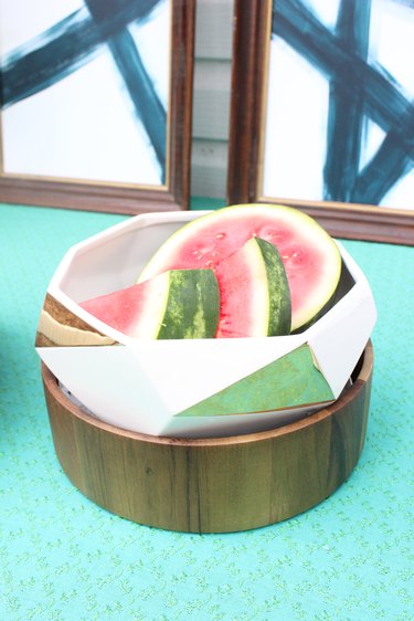 Using a slightly smaller dish, sit it inside the bowl for serving.
