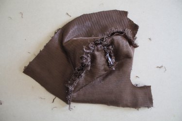 Sew both side hood pieces to the center piece.