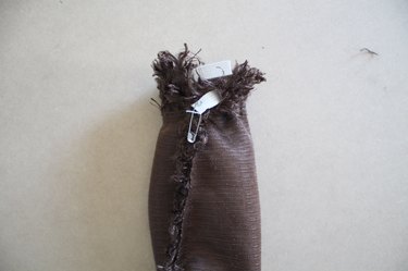 Sew the ends of the elastic together.