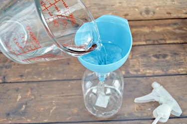Add water to spray bottle.