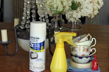 Supplies needed to make a teacup chandelier.