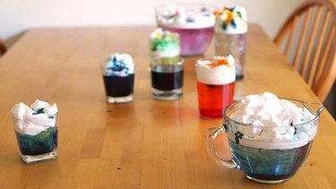 Variety of containers and colors of shaving cream clouds