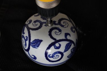 Drilling through the top of the lid