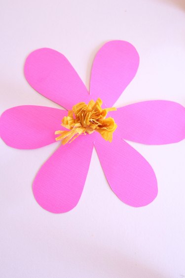 Glue stamen to the centre of the flower.