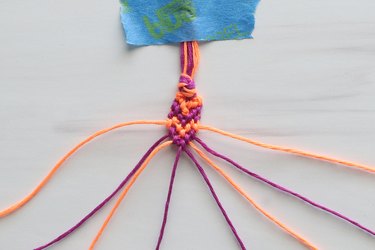 Knotting embroidery thread for a heart friendship bracelet
