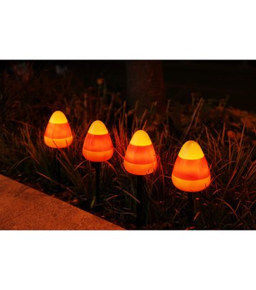 Halloween Candy Corn Pathway Lights from JOANN. There are four lights in a set.