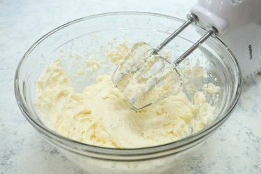 beating the homemade cream cheese mixture