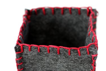 Use a blanket stitch around the top