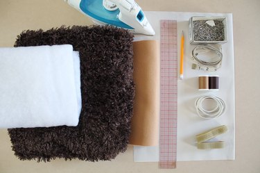 Sewing supplies to make a bear costume.