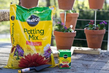 Miracle Gro Potting Mix and Fertilizer.