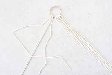 Fold the left strand of cord