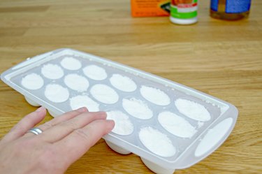 Pressing DIY toilet cleaning tablets into a silicone mold