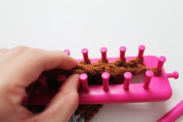 Binding off of the loom.