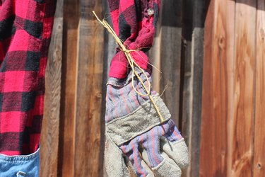 Gloves are secured with twine
