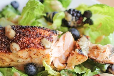 Salmon fillet on a bed of greens
