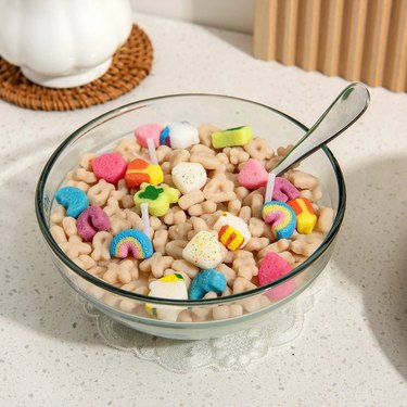 Candle shaped like a bowl of Lucky Charms cereal