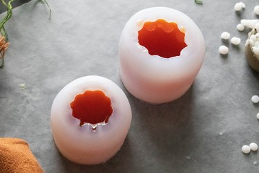 Orange candle wax in pumpkin silicone molds