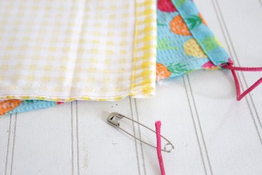 Create this handy checkerboard that's lightweight and convenient enough to throw in a drawer of your camper or even tote along in your backpack.