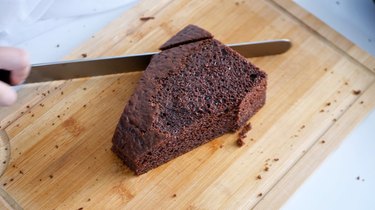 cutting the chocolate cake