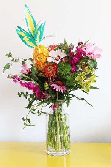 Papier-Mache fruit in a floral arrangement