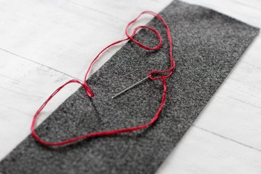 thread and knot a 108-inch piece of embroidery