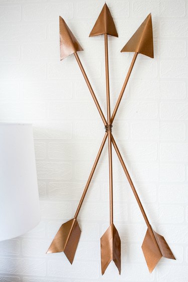 Copper arrows wall art