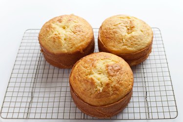 Set the three cakes on a rack to cool them before decorating.