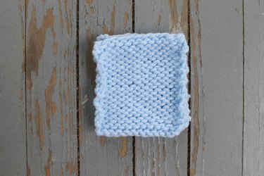 Two pieces of knitted fabric with the right sides together