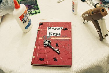 All pieces glued to book cover