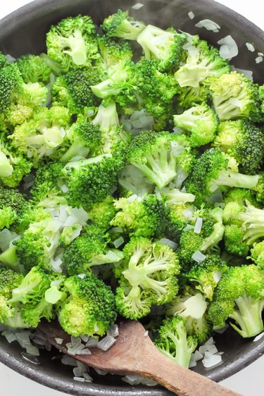 Cook onion and broccoli until tender.