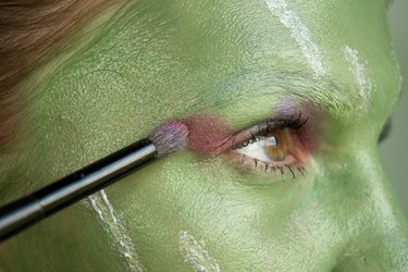 Apply red eye shadow