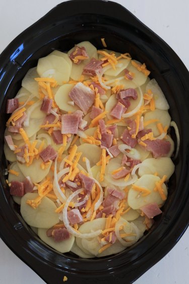 final layer of potatoes, ham