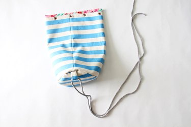 Slip rope through bottom strap