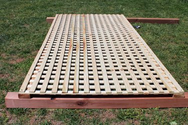 lay 8 foot posts underneath lattice
