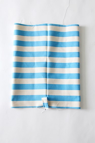 Pin and sew strap to bag